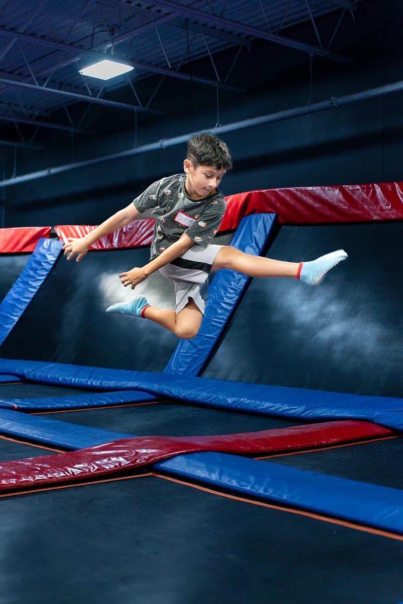 Families enjoying the trampolines and indoor attractions at AeroSports Windsor