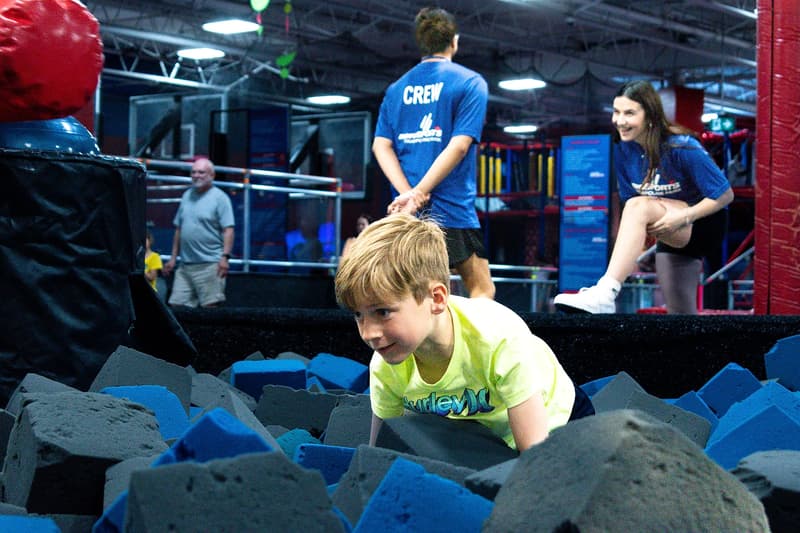 Kids playing in the foam pit at AeroSports trampoline park