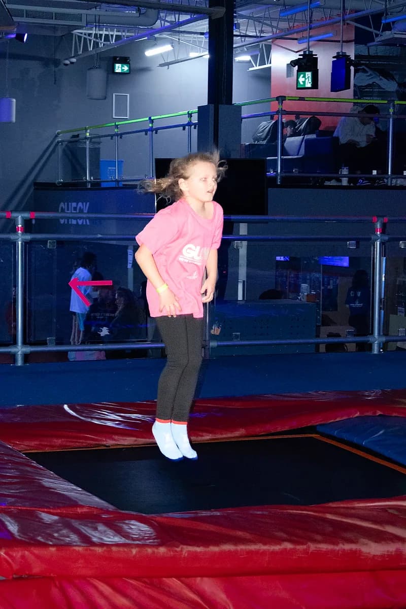 Kid jumping on trampolines during open jump at AeroSports