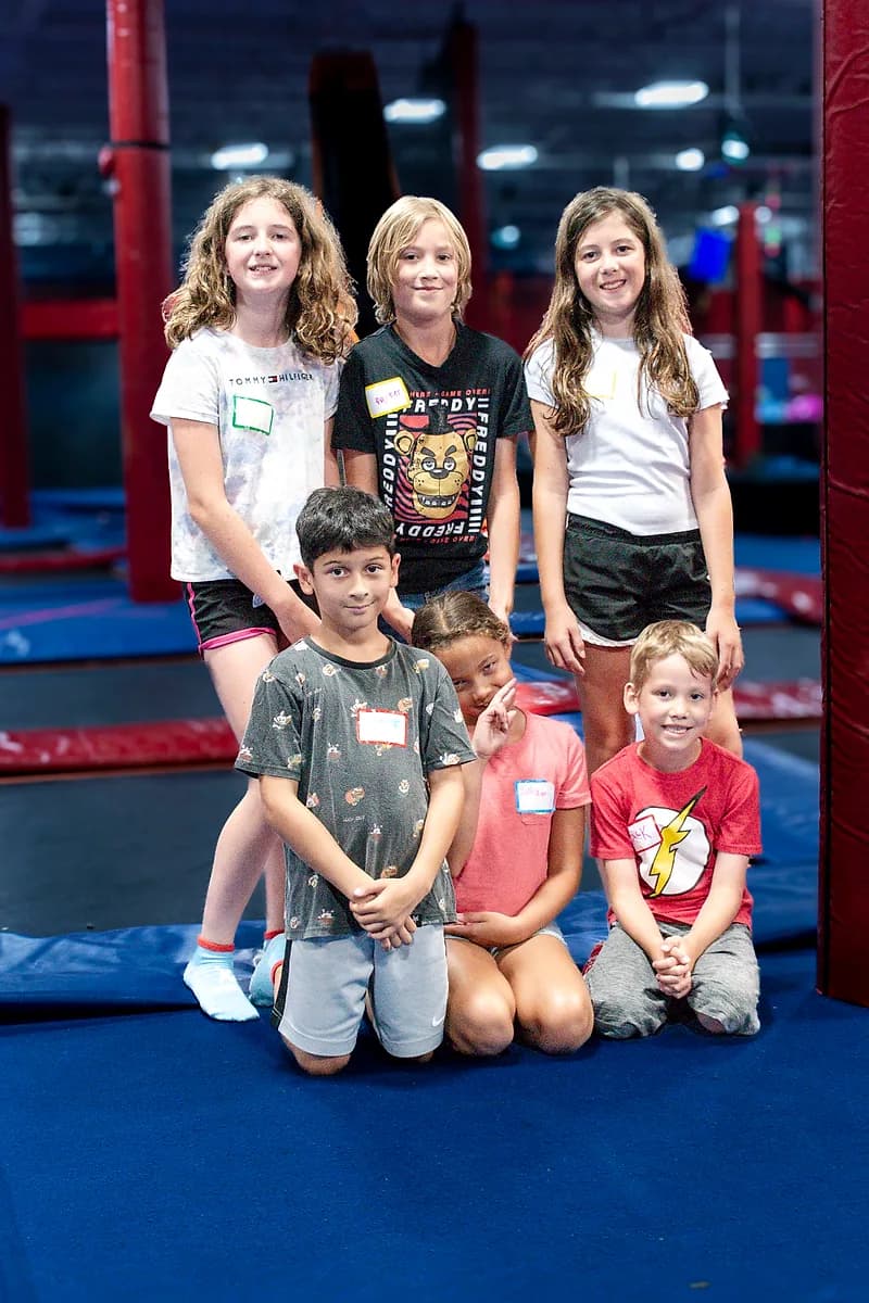 Kids enjoying summer camp activities at AeroSports trampoline park