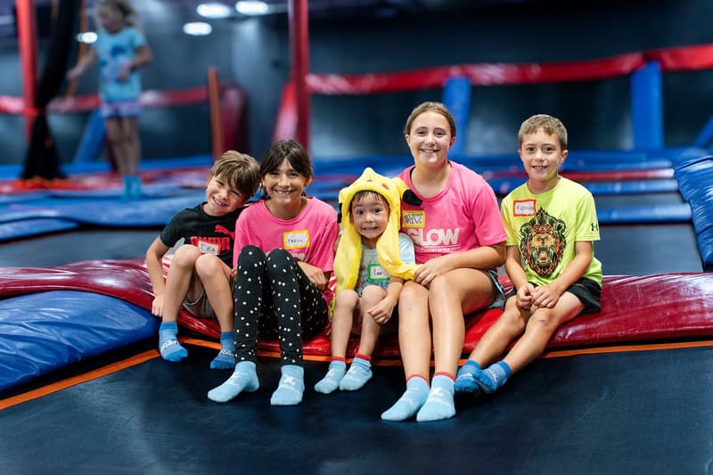 Kids enjoying summer camp activities at AeroSports trampoline park